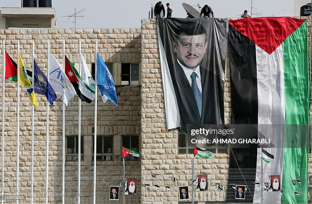 Posters of Jordanian King Abdullah II (L