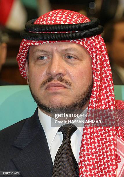 Photo dated 07 December 2005 shows King Abdullah II of Jordan attending the opening session of the 57-member Organization of the Islamic Conference...
