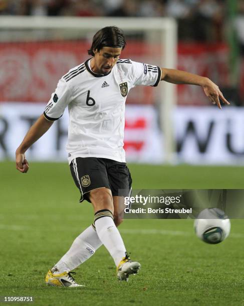 Sami Khedira of Germany runs with the ball during the EURO 2012 Group A qualifier match between Germany and Kazakhstan at Fritz-Walter-Stadium on...