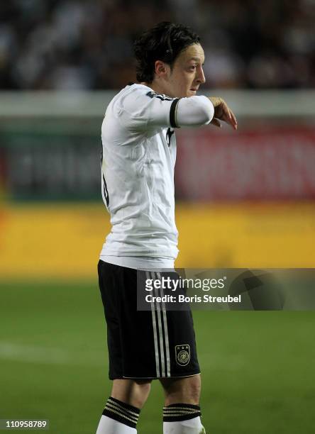 Mesut Oezil of Germany gestures during the EURO 2012 Group A qualifier match between Germany and Kazakhstan at Fritz-Walter-Stadium on March 26, 2011...