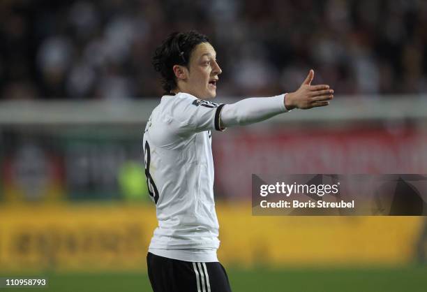 Mesut Oezil of Germany gestures during the EURO 2012 Group A qualifier match between Germany and Kazakhstan at Fritz-Walter-Stadium on March 26, 2011...