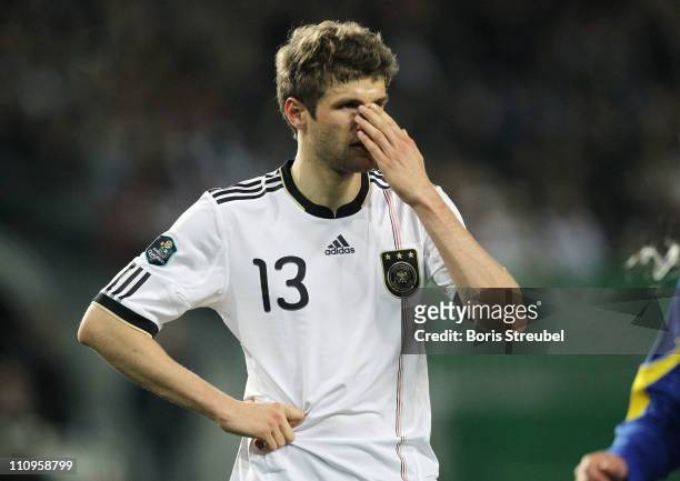 Thomas Mueller of Germany reacts during the EURO 2012 Group A qualifier match between Germany and Kazakhstan at Fritz-Walter-Stadium on March 26,...