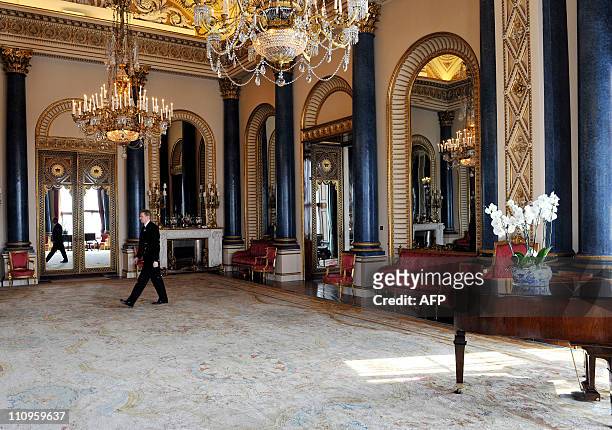 Palace Steward Nigel McEvoy, walks through the Music Room, which will be used during the wedding reception of Prince William and Kate Middleton, at...