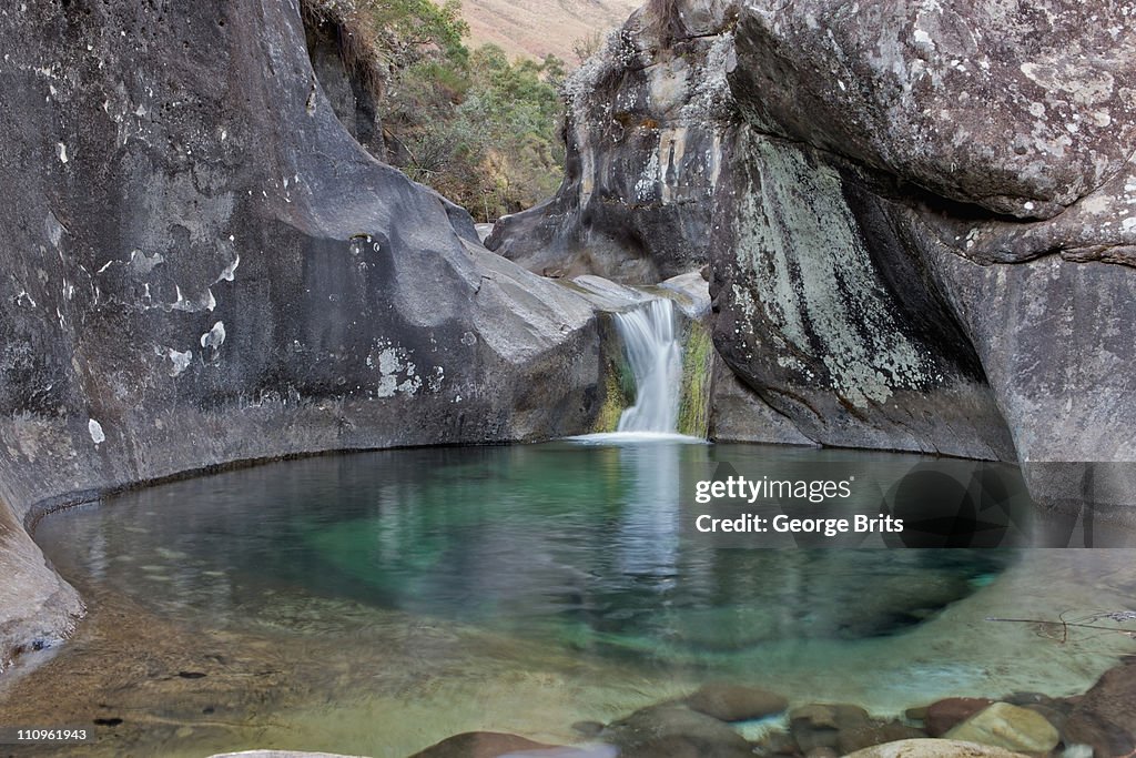 Stream Dropping Into Pool Njesuthi Valley Drakensberg Mountains