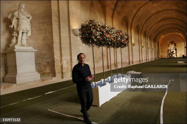 Contemporary art exhibited at the castle of Louis XIV for the "Versailles Off" nights - Artist Marc Couturier by his work 'Vous etes ici', bronze and...