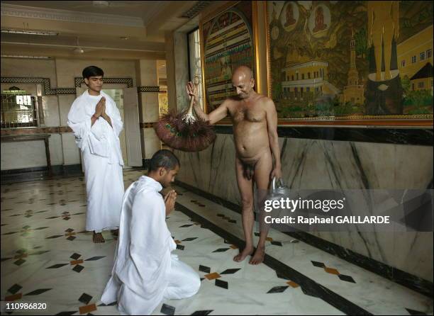 Mumbai In the city's oldest Jainist Digambara temple 108 Bhagwan Parshwanath Digambar, a 50-year-old Acharya Puspadantasagara Guru, uses his peacock...