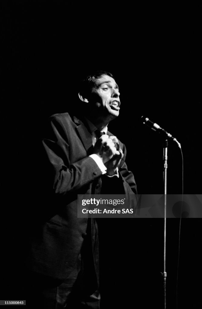 Jacques Brel performs at the Olympia in Paris, France in October , 1964