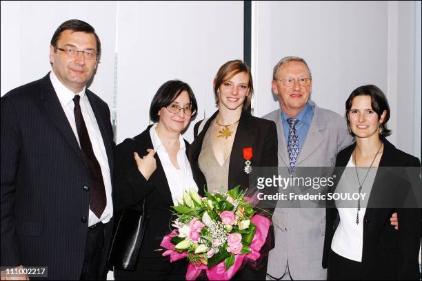 French sports minister Jean Francois Lamour awards the Legion Honour medal to Virginie Dedieu in Paris, France on April 11th, 2007 - French sports...