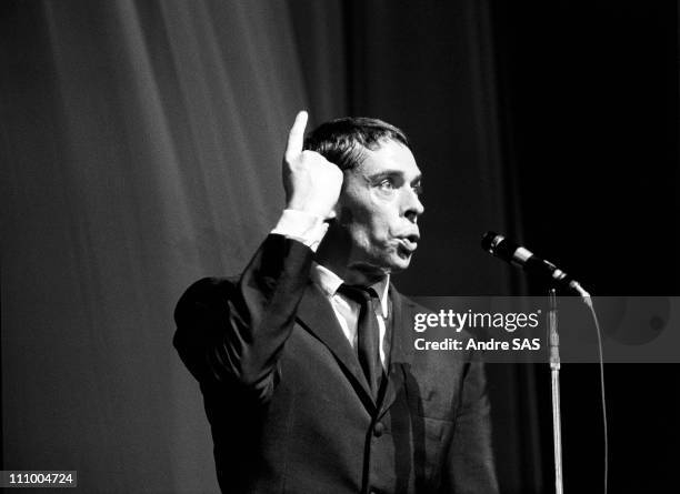 Jacques Brel performs at the Olympia in Paris, France in October , 1964