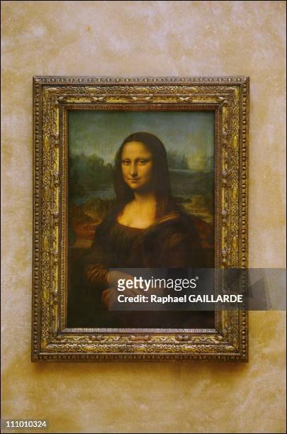 Leonardo da Vinci's masterpiece, Mona Lisa in her new setting in the refurbished Salle des Etats where the public was able to rediscover her in...