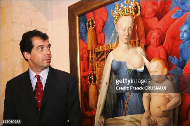 Prince Charles Emmanuel of Bourbon-Parme watches a copy of Jean Fouquet's painting "Virgin and Child" in Loches, France on April 2nd, 2005.