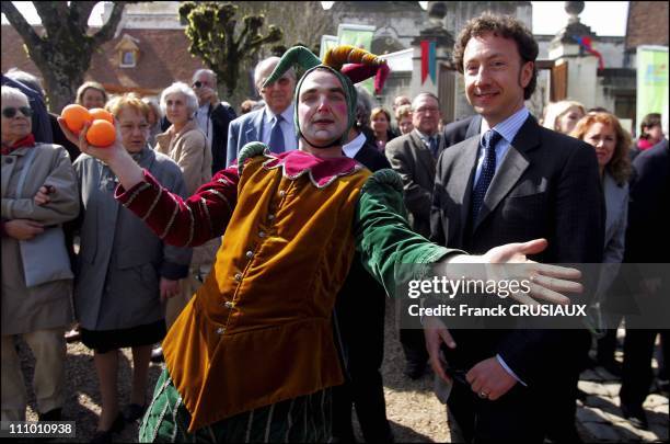 Stephane Bern meeting a jester in Loches, France on April 2nd, 2005.