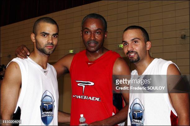 Press conference Power District 2005 with Tony Parker in Paris, France on June 27th, 2005 - Tony Parker, his father TP Parker Senior and his brother...