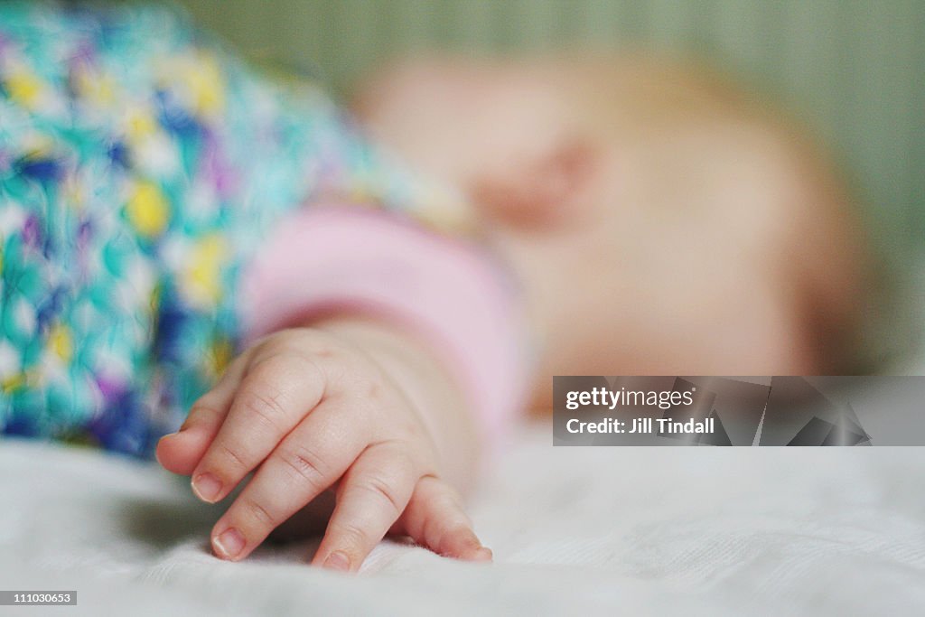 Sleeping baby hand