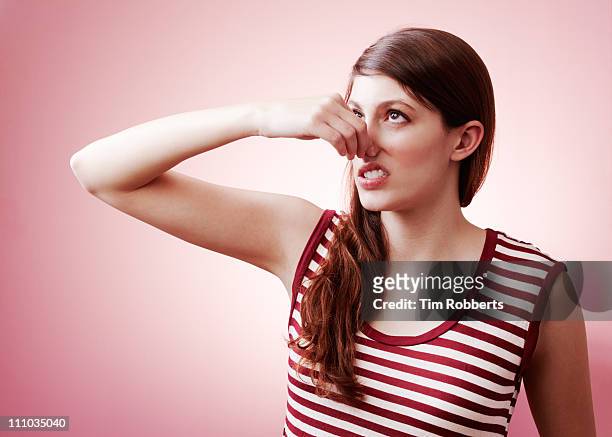 urghhh, bad smell. - unpleasant smell stock pictures, royalty-free photos & images