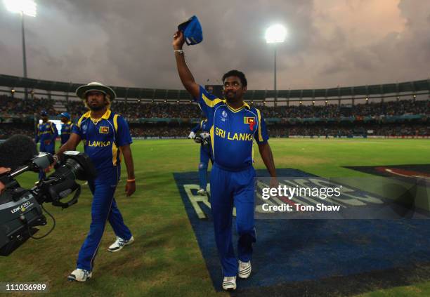 Muttiah Muralitharan of Sri Lanka leaves the field for the last time in Sri Lanka during the 2011 ICC World Cup Semi-Final match between New Zealand...