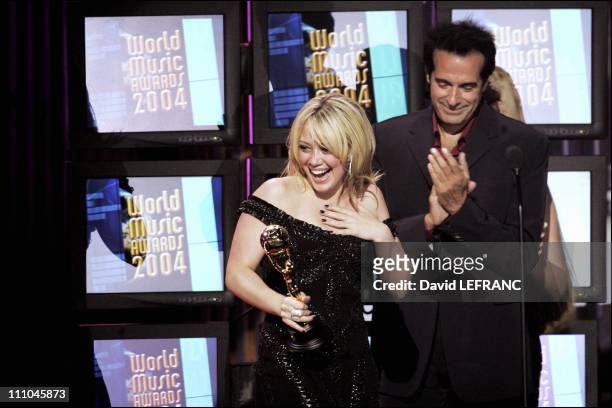 Hilary Duff and David Copperfield at The sixteenth World Music Award in Las Vegas, United States on September 16, 2004.