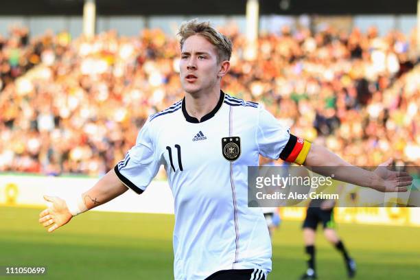 Lewis Holtby of Germany celebrates his team's first goal during the U21 international friendly match between Germany and Italy at Auestadium on March...