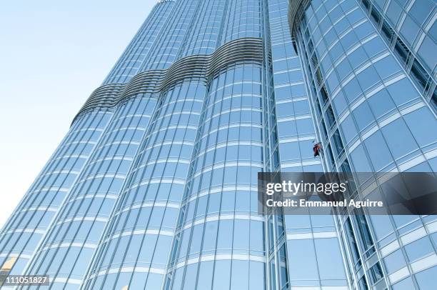 Alain Robert, known as the French "Spiderman" climbs the highest building in the world, Burj Khalifa on March 28, 2011 in Dubai, United Arab...