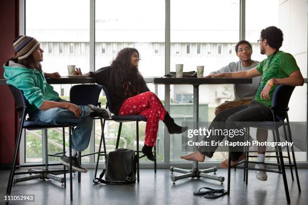 friends hanging out in cafe - maldivian ethnicity stock pictures, royalty-free photos & images