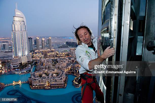 Alain Robert, known as the French "Spiderman" climbs the highest building in the world, Burj Khalifa on March 28, 2011 in Dubai, United Arab...