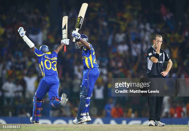 Thilan Samaraweera and Mahela Jayawardena of Sri Lanka celebrate their teams win, as Andy McKay of New Zealand looks on during the 2011 ICC World Cup...