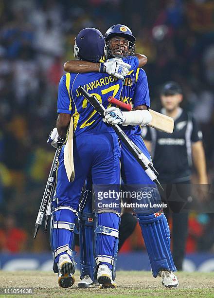 Thilan Samaraweera and Mahela Jayawardena of Sri Lanka celebrate their teams win during the 2011 ICC World Cup Semi-Final match between New Zealand...