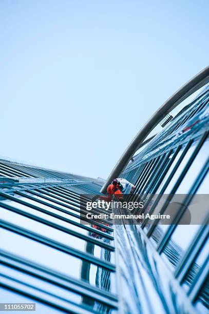 Alain Robert, known as the French "Spiderman" climbs the highest building in the world, Burj Khalifa on March 28, 2011 in Dubai, United Arab...