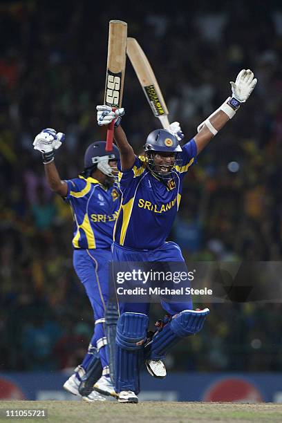 Thilan Samaraweera of Sri Lanka celebrates hitting the winning runs and victory by five wickets during the 2011 ICC World Cup Semi-Final match...