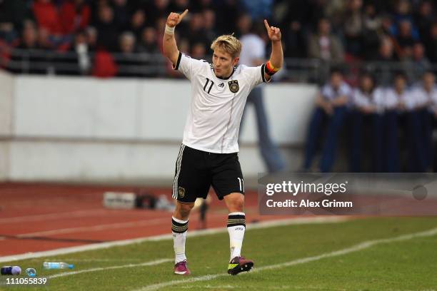 Lewis Holtby of Germany celebrates his team's second goal during the U21 international friendly match between Germany and Italy at Auestadium on...