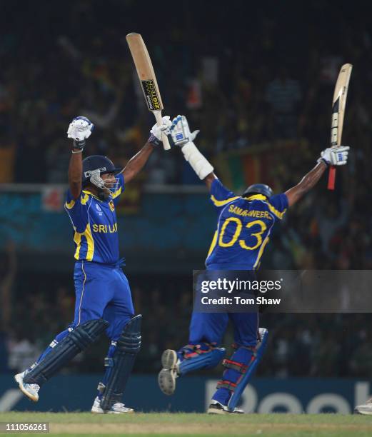 Mahela Jayawardene and Thilan Samaraweera of Sri Lanka celebrate the winning runs during the 2011 ICC World Cup Semi-Final match between New Zealand...