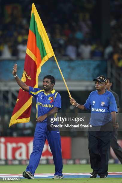 Muttiah Muralitharan of Sri Lanka waves to the crowd after his last match on home soil and his sides five wicket victory during the 2011 ICC World...