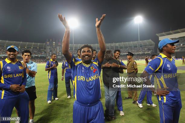 Muttiah Muralitharan of Sri Lanka applauds the crowd after his last match on home soil and his sides five wicket victory during the 2011 ICC World...