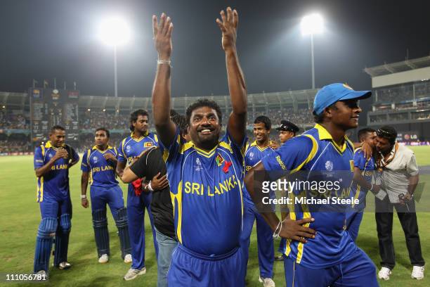 Muttiah Muralitharan of Sri Lanka alongside Ajantha Mathews applauds the crowd after his last match on home soil and his sides five wicket victory...