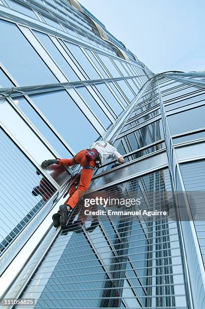 Alain Robert, known as the French "Spiderman" climbs the highest building in the world, Burj Khalifa on March 28, 2011 in Dubai, United Arab...