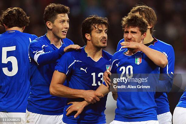 Fabio Borini of Italy celebrates his team's second goal with team mates Giulio Donati, Luca Marrone and Daniele Mori during the U21 international...
