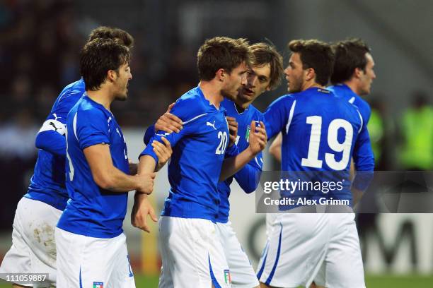 Christian Maggio of Italy celebrates his team's second goal with team mates during the U21 international friendly match between Germany and Italy at...