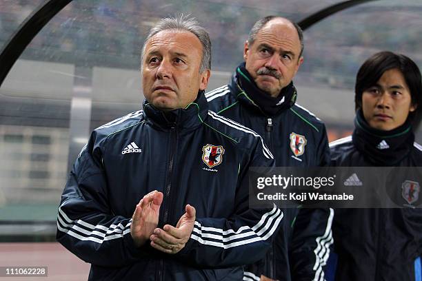 Japan team coach Alberto Zaccheroni waits for the start of the charity match for those suffer the earthquake and tsunami at Nagai Stadium on March...