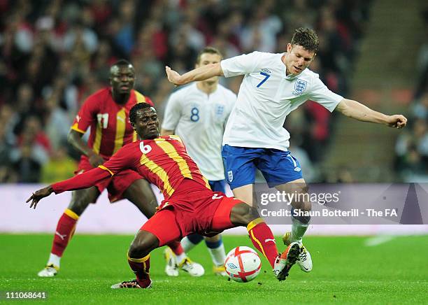 Anthony Annan of Ghana vies with James Milner of England during the international friendly match between England and Ghana at Wembley Stadium on...
