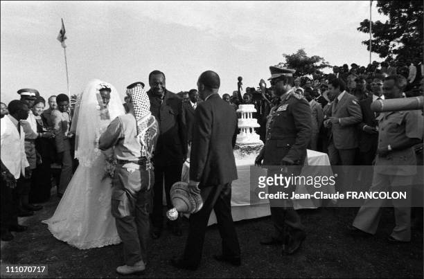 Idi Amin Dada and wife, Yasser Arafat, King Sobhuza of Swaziland at the wedding in Kampala, Uganda in August, 1975.