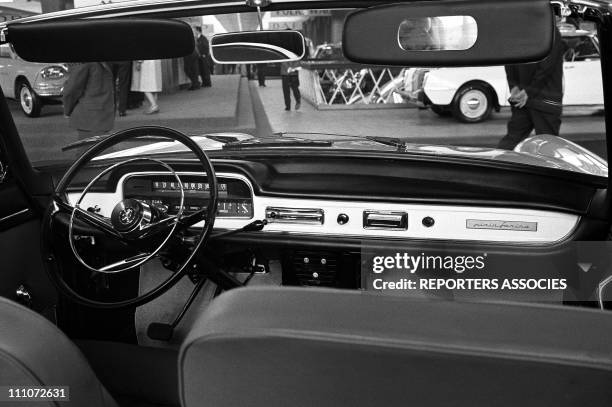 Peugeot 404 coupe in car showroom in Paris, France on October 04, 1962.