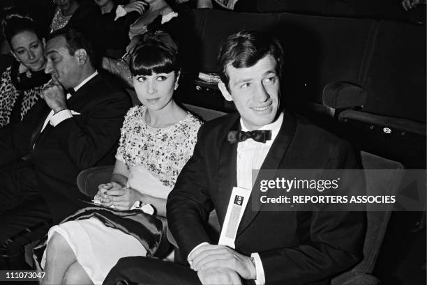 Premiere of "WEEK-END A ZUYDCOOTE" - Jean-Paul Belmondo and wife Elodie in France on December 18, 1964