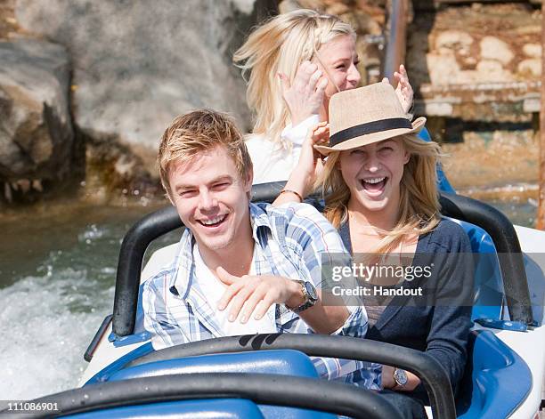 In this handout photo provided by Disney Parks, Julianne Hough and Derek Hough ride the Matterhorn Bobsleds on March 29, 2011 at Disneyland in...