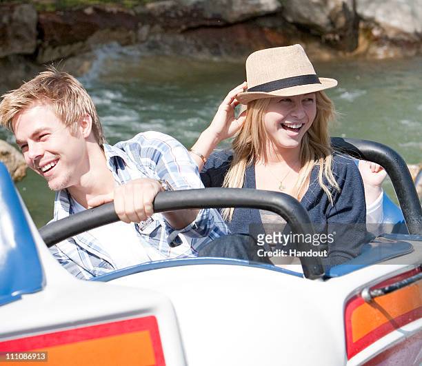 In this handout photo provided by Disney Parks, Julianne Hough and Derek Hough ride the Matterhorn Bobsleds on March 29, 2011 at Disneyland in...
