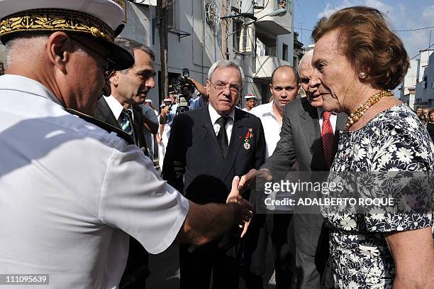 French rear admiral Loic Rafaelli greets Cuban vicepresident Jose Ramon Fernandez , alongside French Napoleon Princess Alix de Foresta, Havana's...