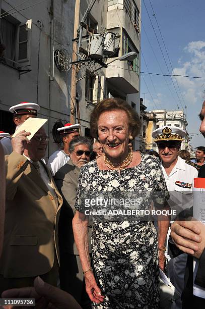 French Napoleon princess Alix de Foresta walks along the street during the reopening of Napoleon Museum in Havana on March 29, 2011. AFP...