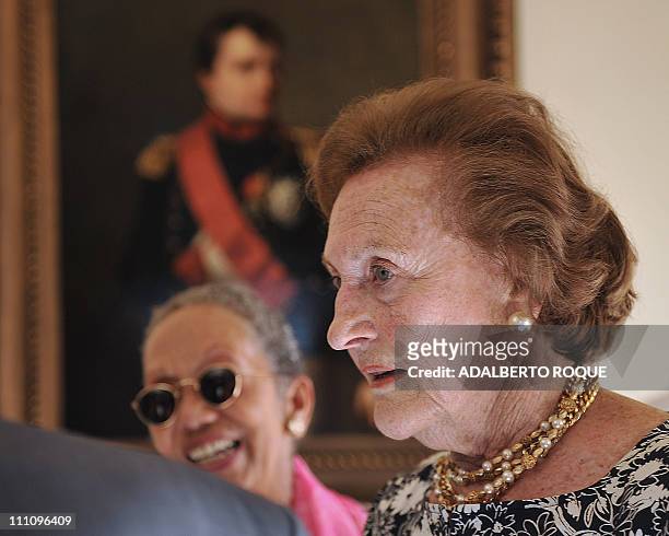 French Napoleon princess Alix de Foresta talks with museum staff during the reopening of the Napoleon Museum in Havana on March 29, 2011. AFP...