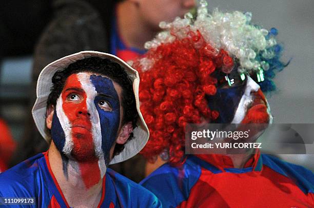 Costa Ricans fans with their painted faces wait for the start of the friendly match between Costa Rica and Argentina, at the new National Stadium, in...