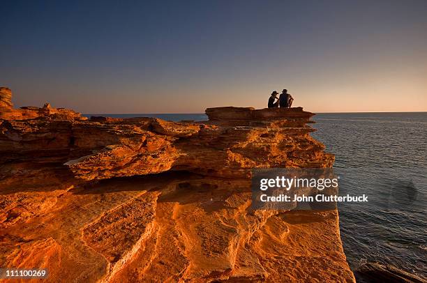 couple, gantheaume point broome wa australia - broome australia stock pictures, royalty-free photos & images