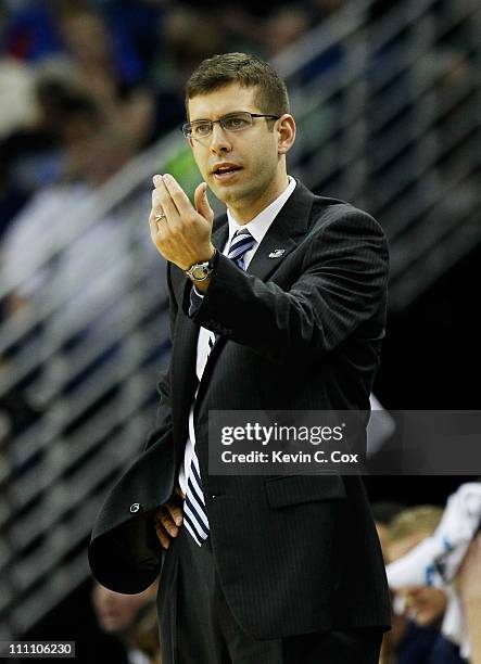 Head coach Brad Stevens of the Butler Bulldogs reacts during their game against the Florida Gators in the Southeast regional final of the 2011 NCAA...